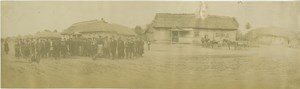 Panorama of Russian country side crowd & House