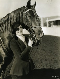 Jeanette MacDonald riding in the aisles of Beverly Hills MGM Photo 1932