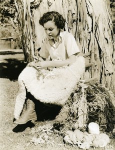 Maureen O'Sullivan spending leisure time making a hooked rug MGM Photo 1932