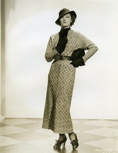 Myrna Loy in stylish brown dress and gray wool MGM Photo 1932
