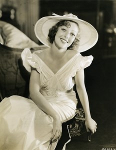 Loretta Young wearing an elegant red dress taffeta MGM Photo 1932