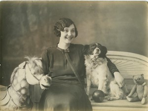 France young woman with her dog and toys teddy bear horse old Photo 1925