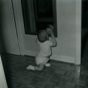 Belgium Toddler looking own reflection in Window Old Small Snapshot Photo 1964