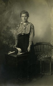 France Woman reading a leaflet checked shirt Old Real Photo Postcard RPPC 1920