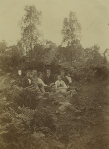 France Group resting from nature walk Ferns Trees Old Snapshot Photo 1912