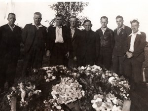 WWII Men Group around Bunch of Flowers Funeral? Old Photo 1942